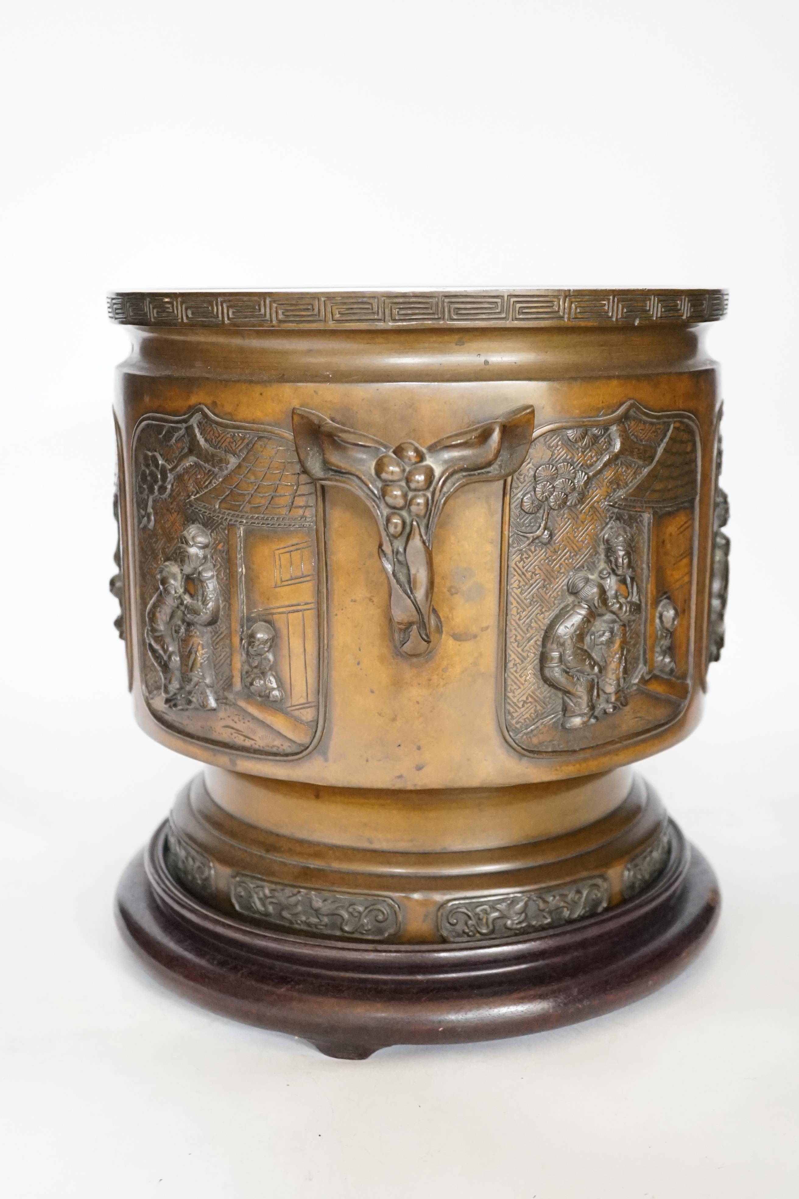 A large 19th century Japanese bronze two handled censer on stand, 28cm high